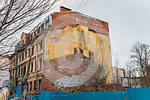 An abandoned house with the traces of destructions