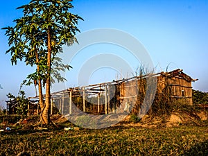 ABANDONED HUT AND BLUE SKY