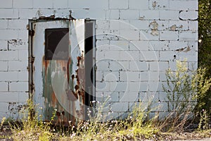 Abandoned Industrial Building with Door Open