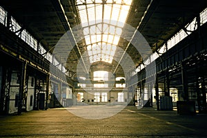 Abandoned industrial interior with bright light