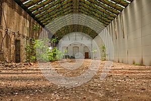 Abandoned industrial interior with bright light