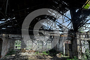 Abandoned industrial interior with bright light