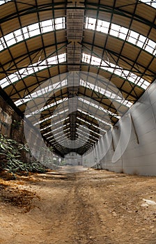 Abandoned industrial interior with bright light