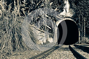 Abandoned inoperative railway. old railway station in abkhazia. tourist natural place with rails photo