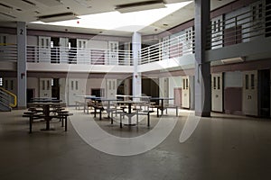 Abandoned jail common room in cell block