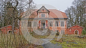 Abandoned manor house in a forest in Pirita photo