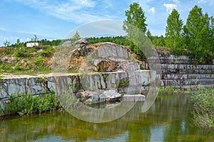 Abandoned marble quarry near the village of Peteni photo