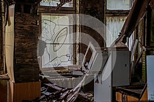 Abandoned, messy, old. creepy, ruined room with windows covered in the building located in the Chernobyl ghost town