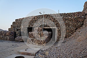 Abandoned military bunker on the mountain in the sunset