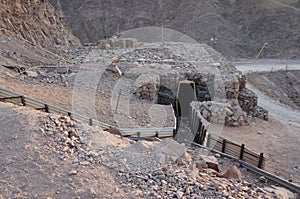 Abandoned military bunker on the mountain in the sunset