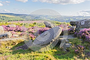 Abandoned millstone on Hathersage Moor in the Derbyshire Peak District.