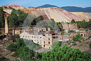 Abandoned mine with tower and ruins.