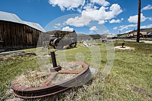 Abandoned mining equipment and buildings in the ghost town of Bodie, a California State Historical Park