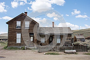 Abandoned mining equipment and buildings in the ghost town of Bodie, a California State Historical Park