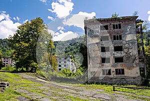 Abandoned mining ghost-town Polyana, Abkhazia. Destroyed empty houses