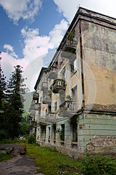 Abandoned mining ghost-town Tquarchal, Abkhazia. Ruined empty house destroyed by war