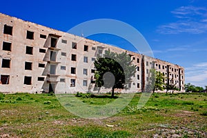 Abandoned multistory house. Consequence of war, disaster, poverty, ghost town, etc