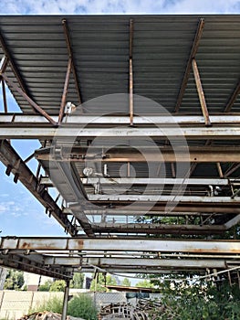 Abandoned nonfunctional metal car parking system
