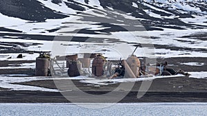 Abandoned norwegian whale hunter station rusty blubber tanks