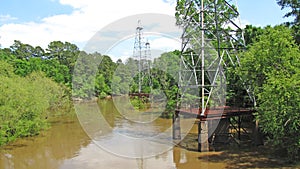 Abandoned oil derricks on the Sabine River