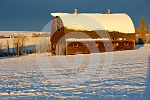 Abandoned old barn in winter