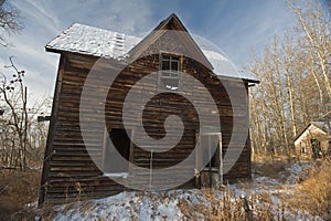 Abandoned old farmhouse in winter