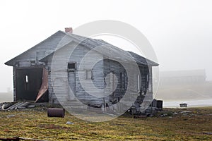 Abandoned old hunting house in tundra of Novaya Zemlya archipelago