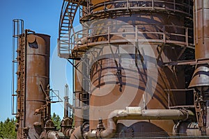 Abandoned old machines and storage units in a gas industry at ga