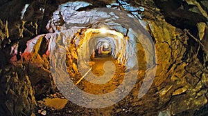 Abandoned old mine shaft tunnel passage