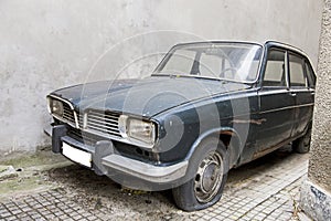 Abandoned old Renault car on the streets of Bucharest 