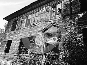 Abandoned old ruined house, a Ghost black-and-white photo