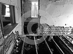 Abandoned old ruined house, a Ghost black-and-white photo