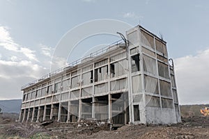 Abandoned old russian soviet style Metal - gas chemical processing factory plant with cooling wind turbines