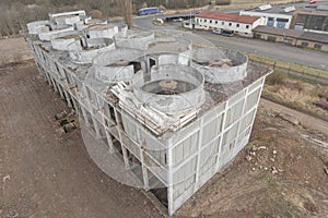 Abandoned old russian soviet style Metal - gas chemical processing factory plant with cooling wind turbines