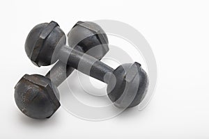 Abandoned old rusty dumbbell on a white background , Neglect of health care concept