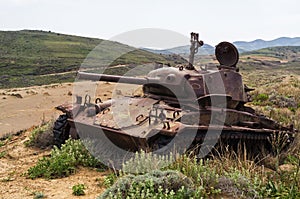 Abandoned old rusty tank on the dunes of Lemnos island, Greece