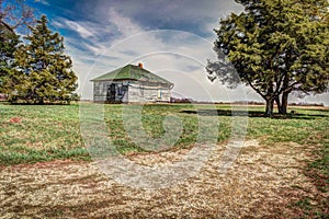 An abandoned old single family farm house