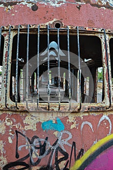 Abandoned old train with rust and graffitis