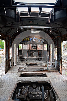 Abandoned old train with rust and graffitis