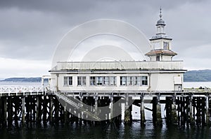 Abandoned old Victorian wooden pier building at Dunoon photo