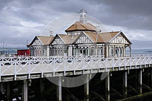 Abandoned old Victorian wooden pier building at Dunoon photo
