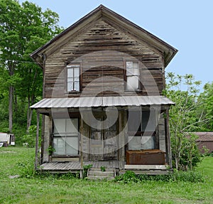 Abandoned old wood plank farm house