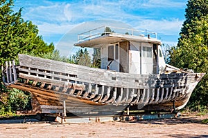 Abandoned old wooden fishing boat near Fazana, a small town on the Istrian peninsula in Croatia