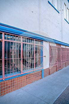 Abandoned out of business building with railings at downtown Tucson, Arizona