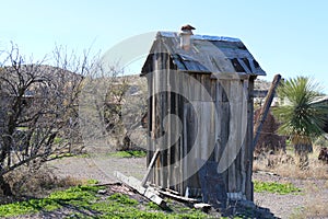 Abandoned outhouse farm shed shack