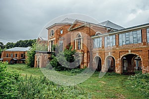 Abandoned and overgrown former Nechaev`s mansion in Polibino village