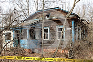 Abandoned overgrown house in Chernobyl Zone. Ukraine