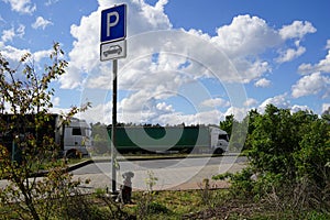 Abandoned pet dog leashed on parking sign pole