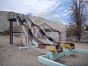 Abandoned playground in chuquicamata city photo
