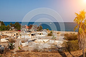 Abandoned pool with bar of Hotel in the Turkish village of kemer. Landscape with ruins, blue sky and sea